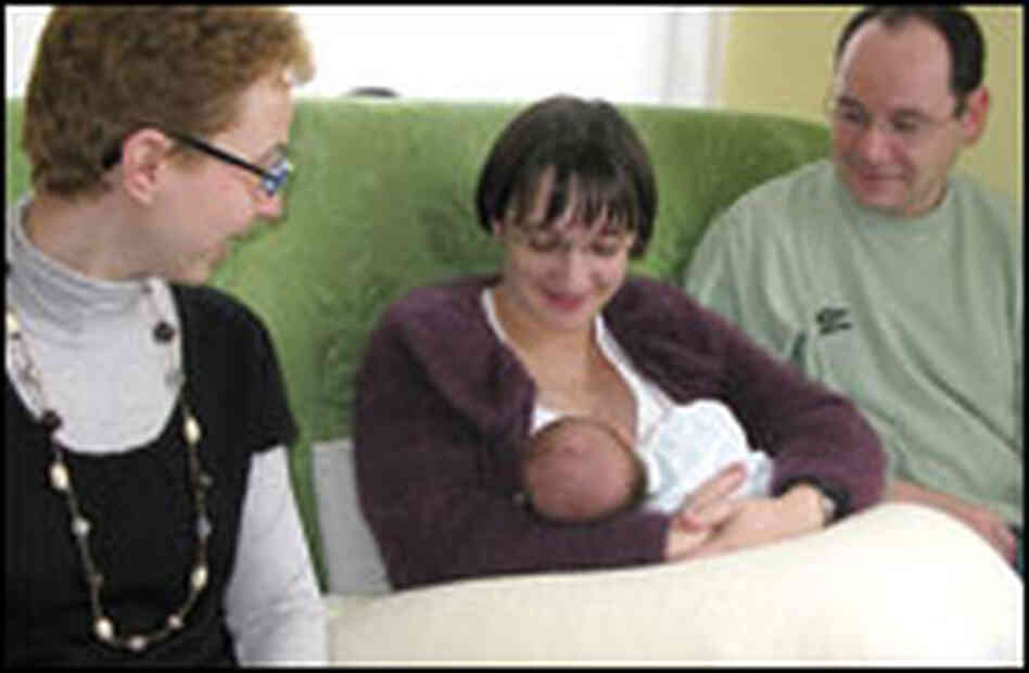 Nurse visits parents and child.