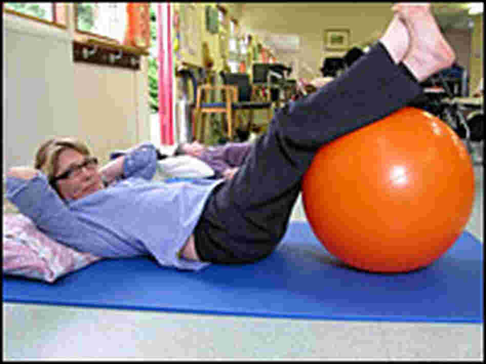 Linda Oatley at a physical therapy session in Buckinghamshire, England.