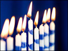 Candles on a menorah Candles on a menorah