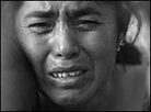 Mother at funeral of her murdered daughter. Photo: © 2004 Julian Cardona