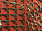 Guns seized by Washington, D.C., police officers over the years are stored at police headquarters. Guns seized by Washington, D.C., police officers over the years are stored at police headquarters.