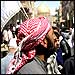 Shia Muslim partisans demonstrate in Najaf.