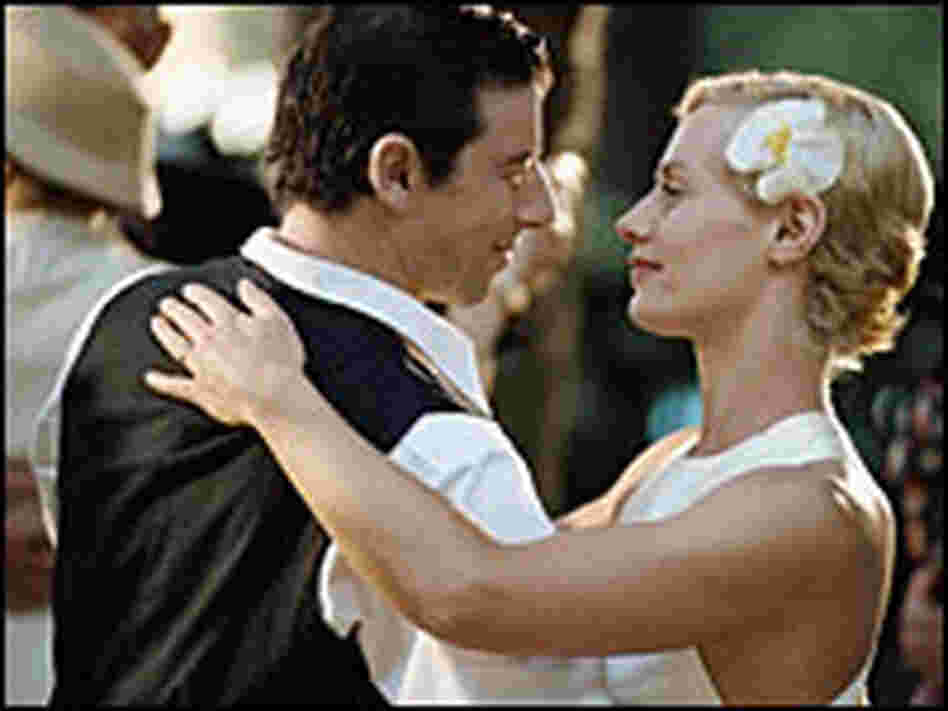 Patrick Bruel and Cecile de France, dancing