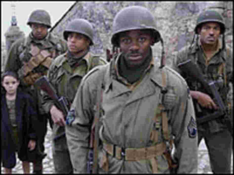 The army unit flanks the Italian kid they've rescued