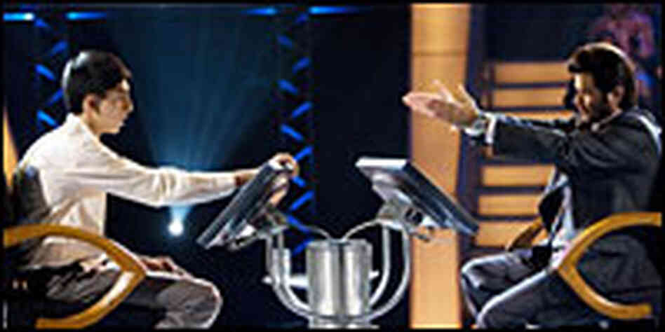 Jamal Malik and Anil Kapoor as Prem Kumar