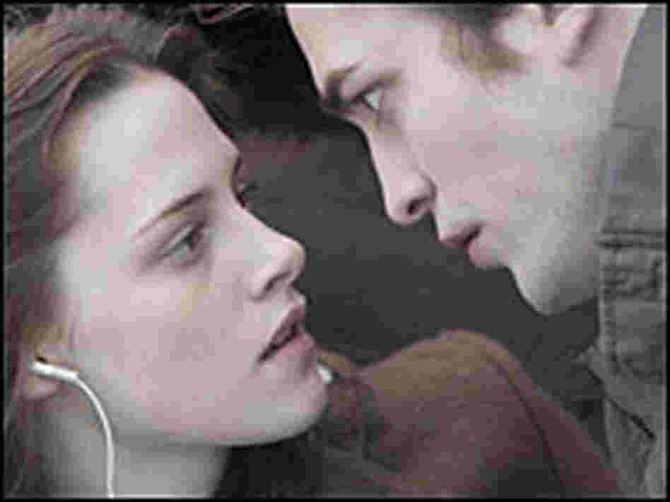 Kristen Stewart as Bella Swan and Robert Pattinson as Edward Cullen