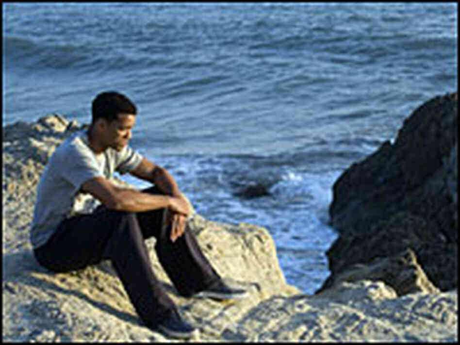 Will Smith as Ben Thomas on cliff