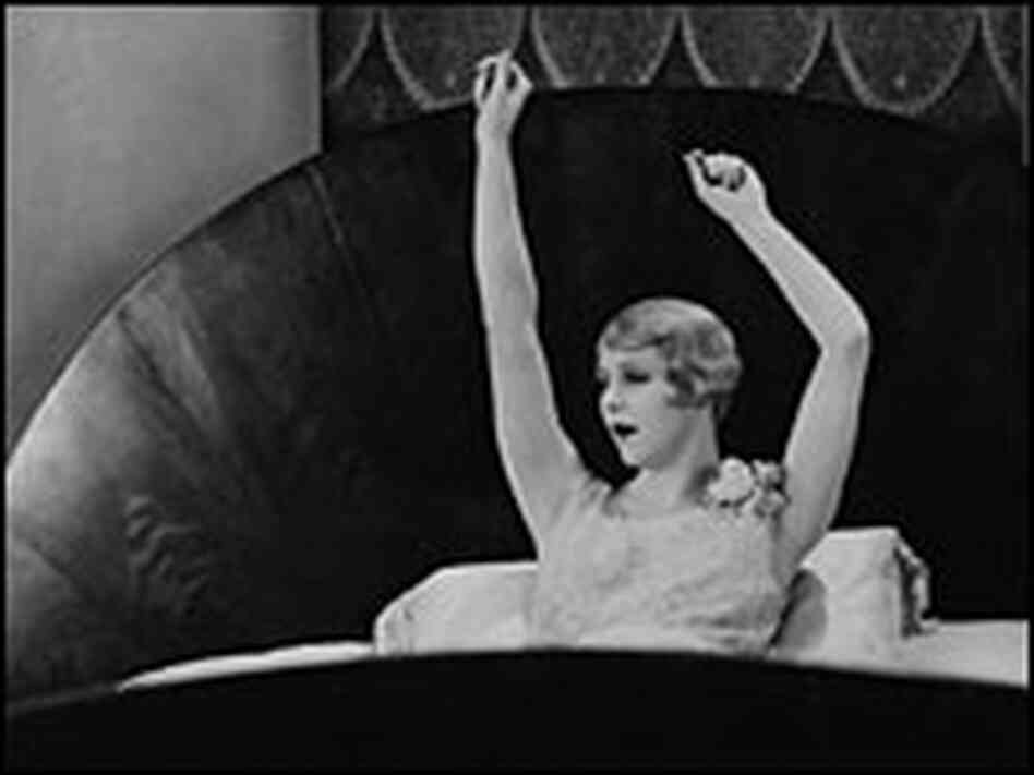 Isabel Jeans stretches upon awakening in 'Easy Virtue'