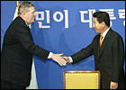 U.S. Assistant Secretary of State James Kelly meets with South Korean President-elect Roh Moo-hyun in Seoul.