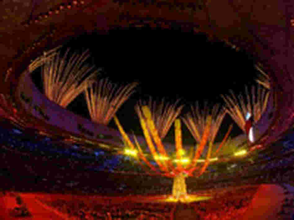 Fireworks ignite over the National Stadium during the closing ceremony of the Beijing Olympics.