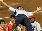 Japanese softball celebrates win Japanese softball celebrates win