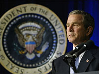 President George W. Bush at podium