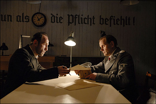 Karl Markovics and Devid Striesow in 'The Counterfeiters.'