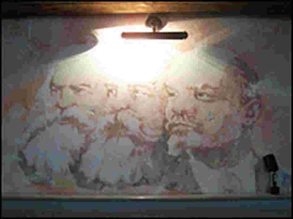 A fresco of Marx, Engels and Lenin in the dining room.