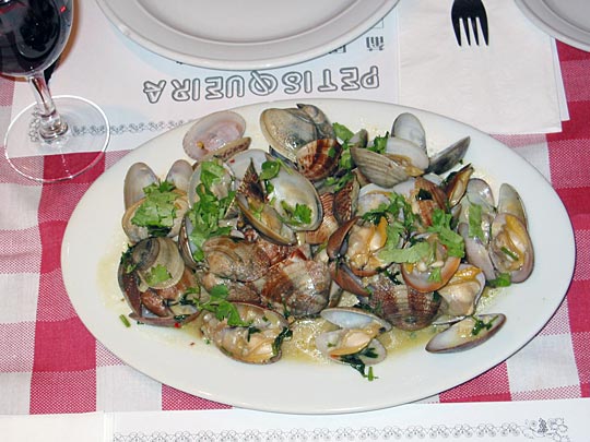 A huge plate of clams, spiced with garlic and cilantro, make a nice starter