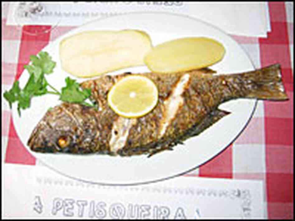 Portuguese food is known for its wealth of seafood, including charcoal-grilled sea bass.