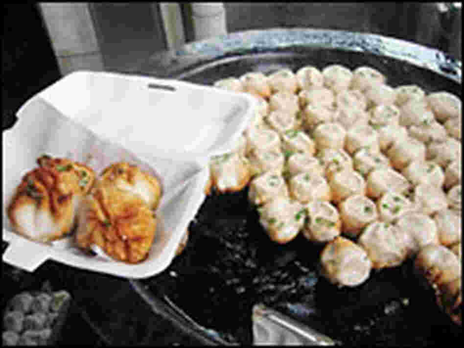 Yang's Fry Dumplings are soupy pockets of goodness with pork filling.