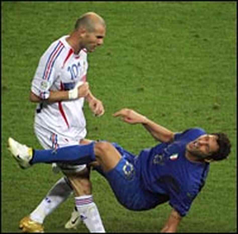 French team captain Zinedine Zidane gestures after head-butting Italian defender Marco Materazzi. French team captain Zinedine Zidane gestures after head-butting Italian defender Marco Materazzi.