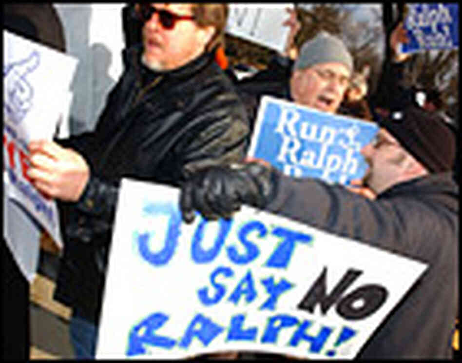 Demonstrators for and against Ralph Nader's candidacy jostle for position as Nader enters the 2004 p Demonstrators for and against Ralph Nader's candidacy jostle for position as Nader enters the 2004 p