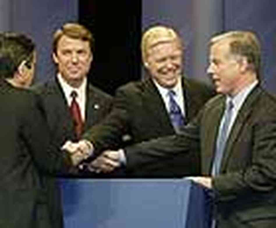 Democratic presidential candidates shake hands after a debate in Iowa, Jan. 4, 2004. Democratic presidential candidates shake hands after a debate in Iowa, Jan. 4, 2004.