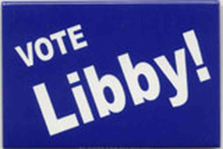 A political button reads "Vote Libby!" A political button reads "Vote Libby!"