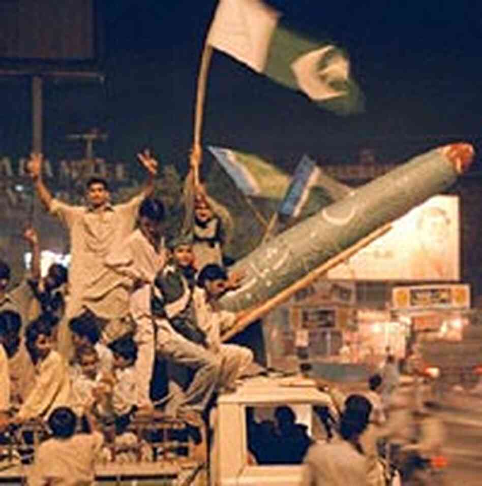 Pakistanis with a model of a Pakistani Ghauri missile Pakistanis with a model of a Pakistani Ghauri missile