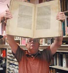 Terry Belanger with book