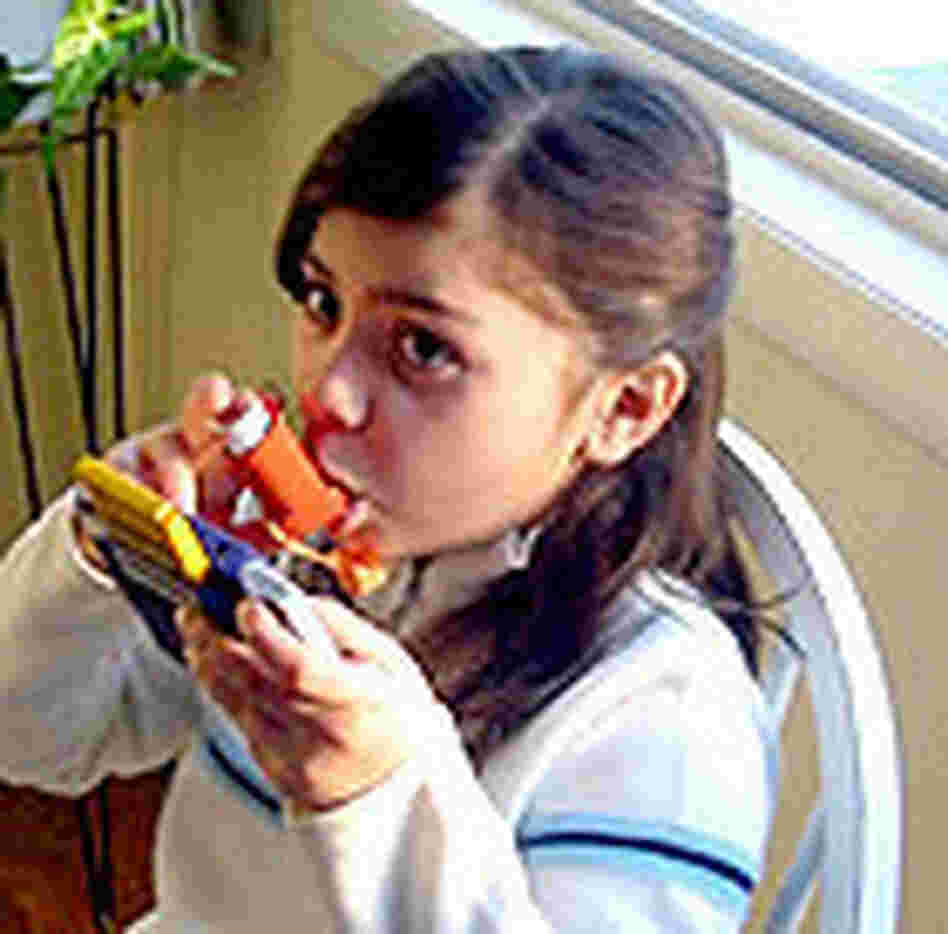 A child with asthma. A child with asthma.