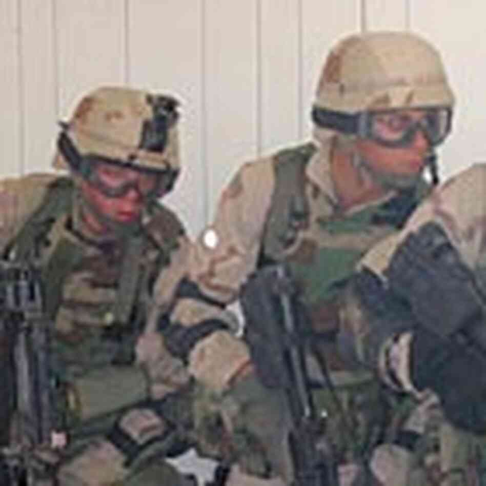 Troops train in urban warfare. Troops train in urban warfare.