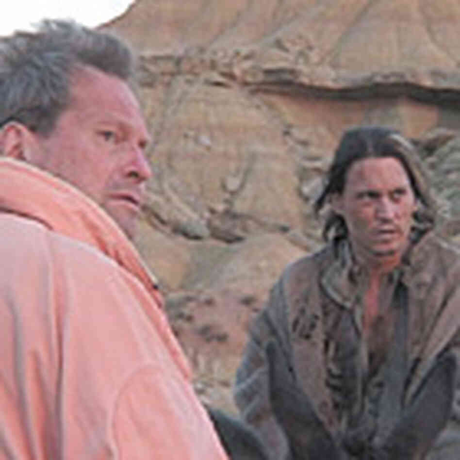 Gilliam, left, and actor Johnny Depp on location in Spain. Gilliam, left, and actor Johnny Depp on location in Spain.