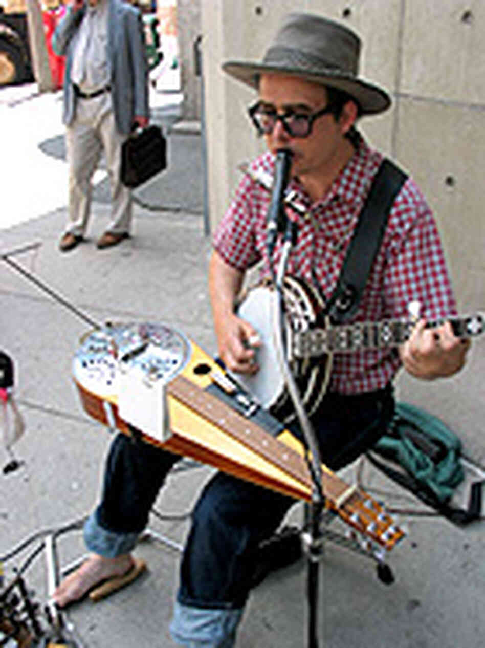 Eric Royer brings his One-Man Band to the streets of Boston. Eric Royer brings his One-Man Band to the streets of Boston.