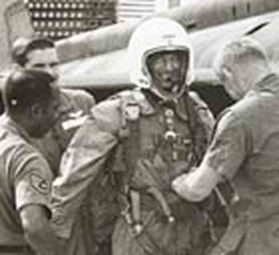 Capt. Banks in full-pressure suit, preparing to climb into the cockpit of his U-2. Capt. Banks in full-pressure suit, preparing to climb into the cockpit of his U-2.