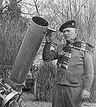 Dr. Leon Stuart with his telescope
