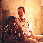 Dr. Farmer and a young Haitian boy named Alcante