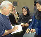 Paulo Coelho signs autographs for fans in Iran, May 2000. Paulo Coelho signs autographs for fans in Iran, May 2000.