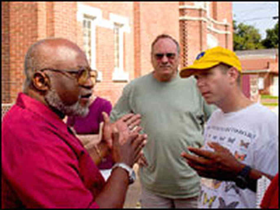 Wazir Peacock, talks with teachers Joseph Heitzman and Tim Garner. Wazir Peacock, talks with teachers Joseph Heitzman and Tim Garner.