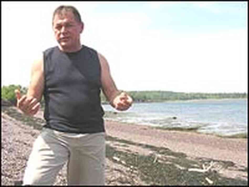 Tribal representative Fred Moore walks along the proposed LNG depot site. Tribal representative Fred Moore walks along the proposed LNG depot site.