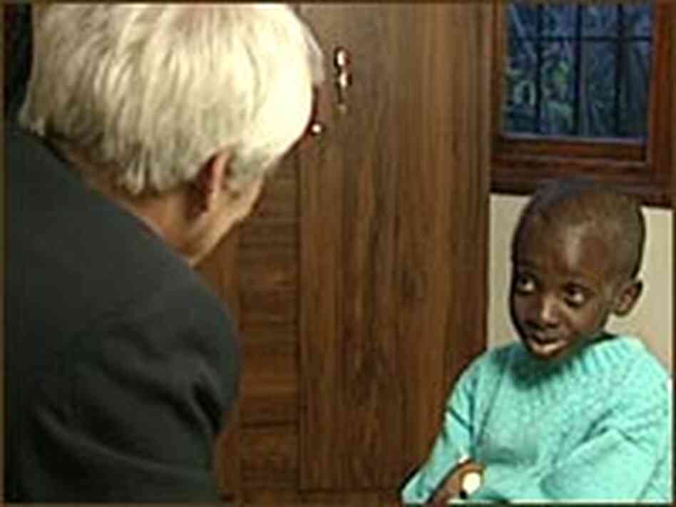 Jim Wooten interviews Nkosi Johnson for a 2001 ABC News report. Jim Wooten interviews Nkosi Johnson for a 2001 ABC News report.