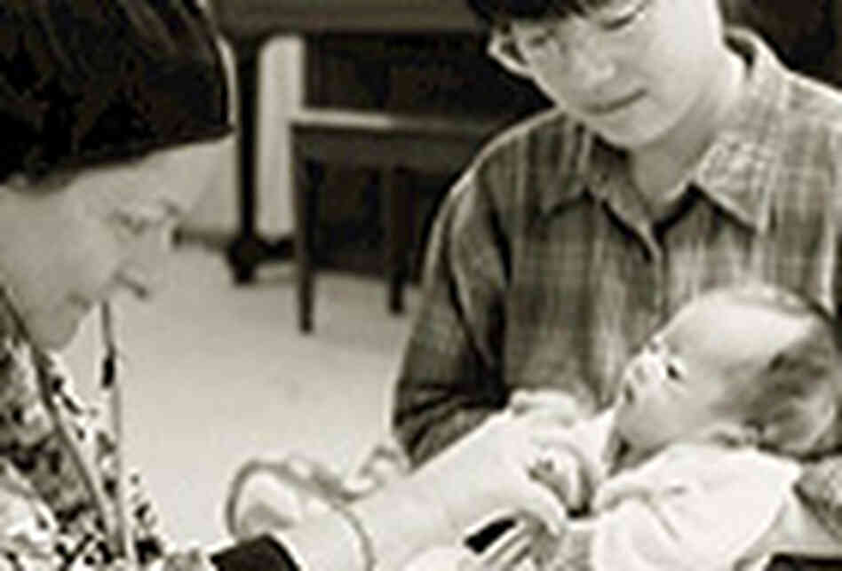 Adam's Hospice nurse, Susan Finkelstien, left, with another infant patient. Adam's Hospice nurse, Susan Finkelstien, left, with another infant patient.