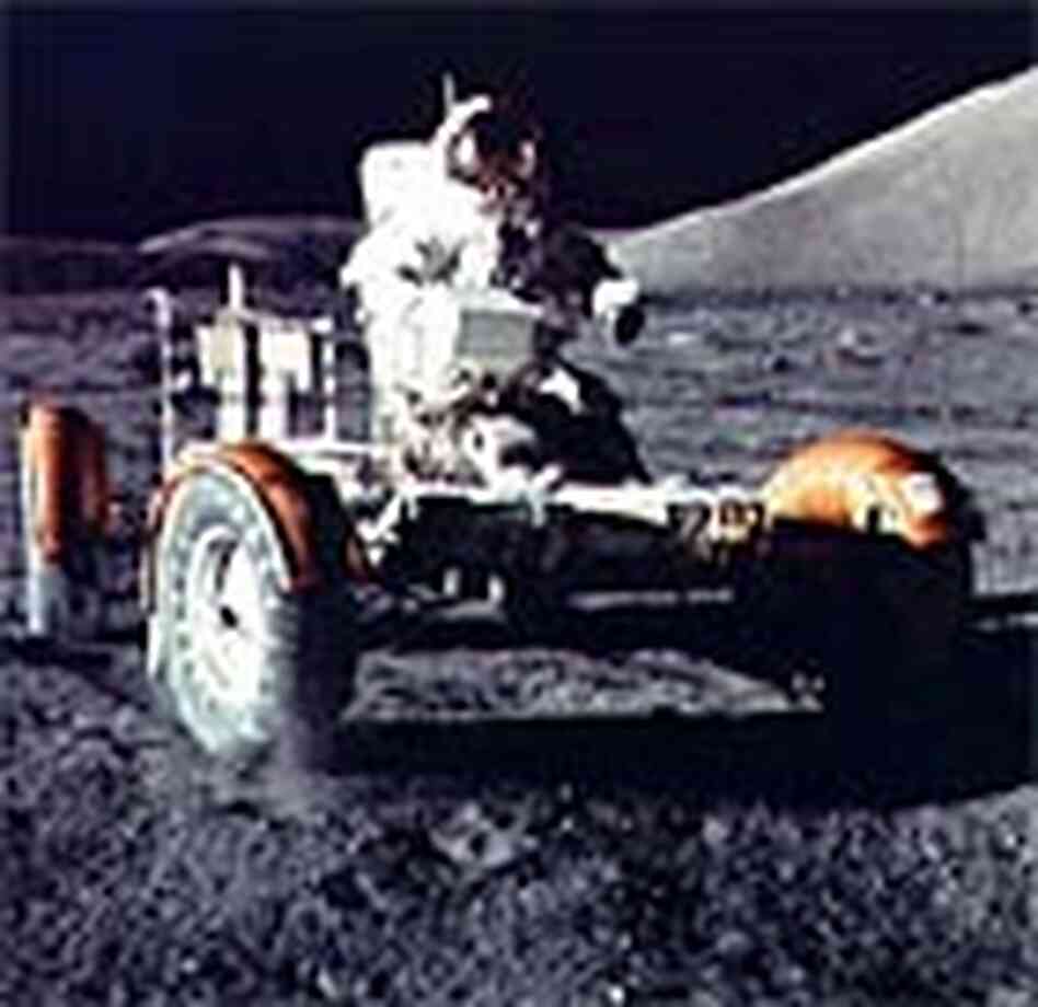 Astronaut Eugene Cernan drives the lunar rover. Astronaut Eugene Cernan drives the lunar rover.