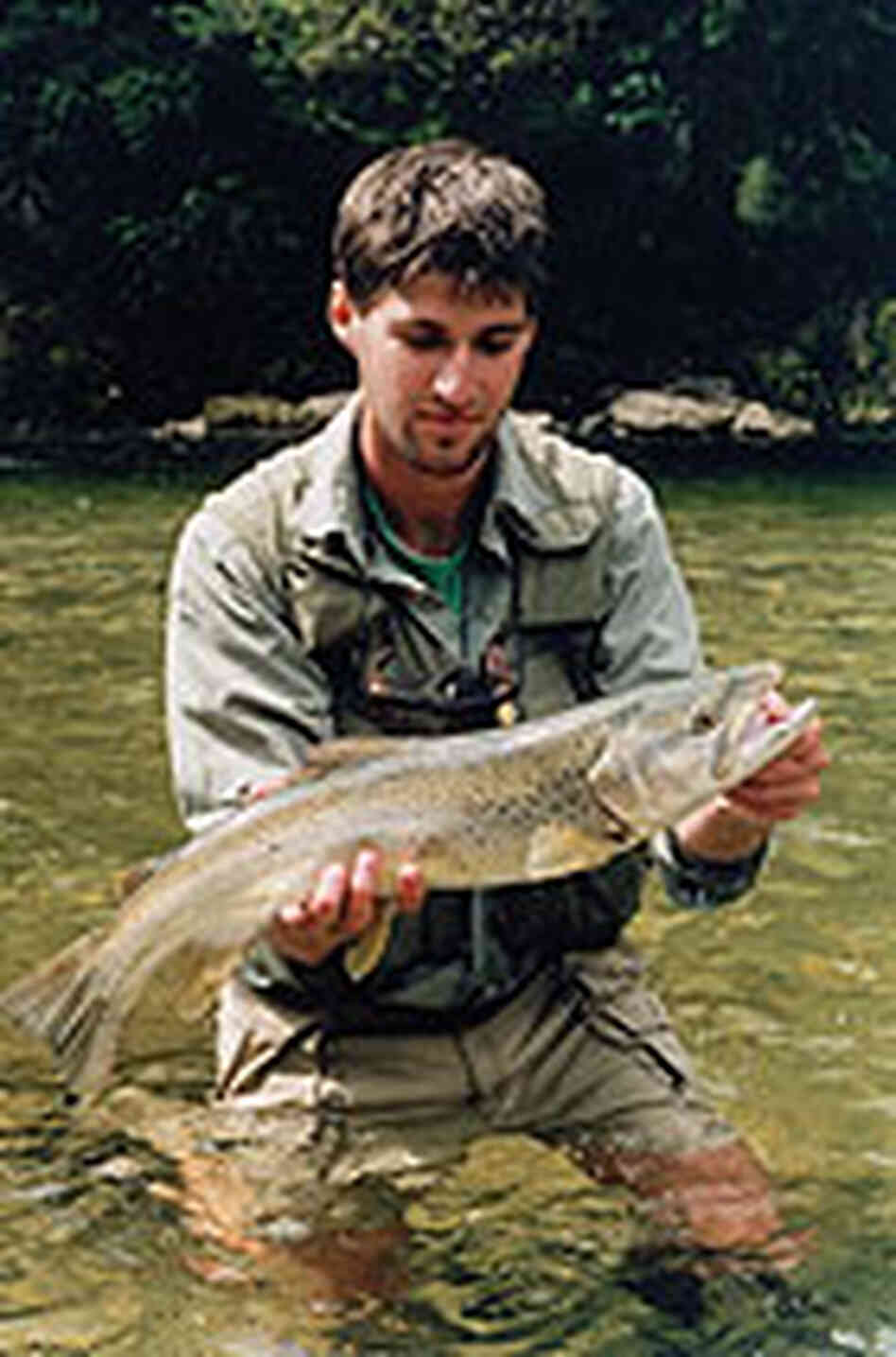 James Prosek, with trout in hand. James Prosek, with trout in hand.