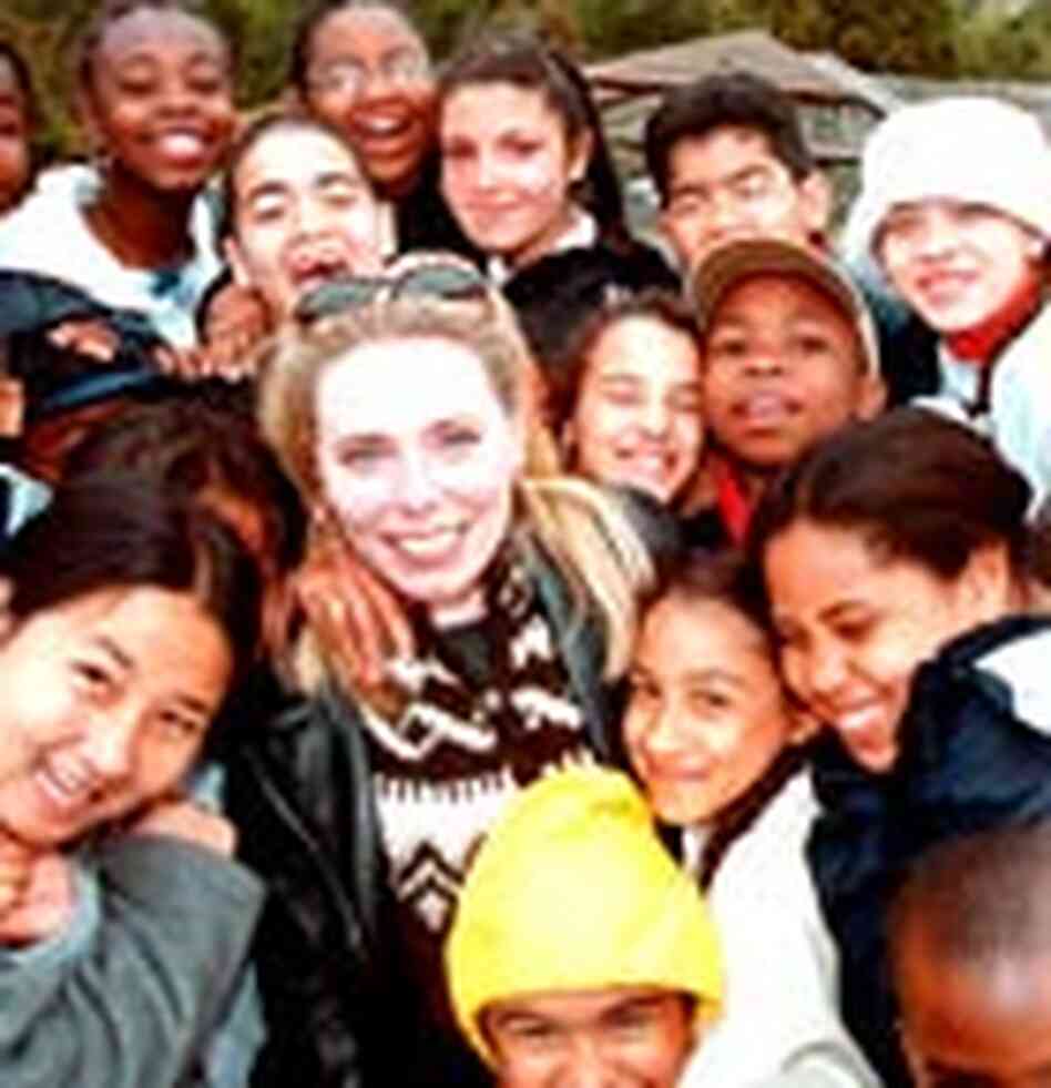 Johanna Grussner, pictured with members of the P.S. 86 choral group. Johanna Grussner, pictured with members of the P.S. 86 choral group.