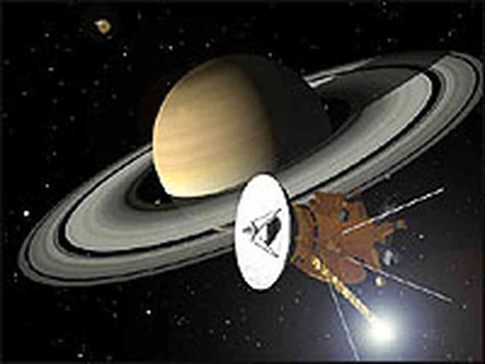 Artist's conception of Cassini entering Saturn's orbit. Artist's conception of Cassini entering Saturn's orbit.
