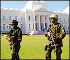 U.S. Marines patrol the grounds of the presidential palace in Port-au-Prince, Haiti, March 1, 2004.