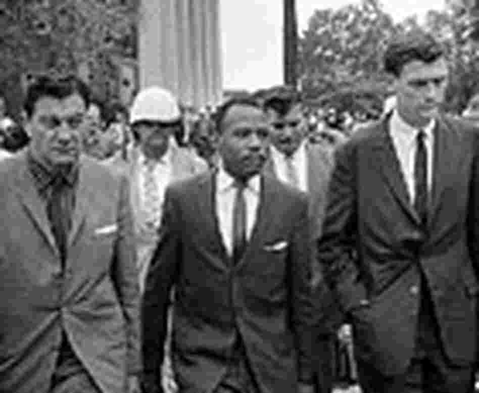 U.S. Marshal James McShane, left, and John Doar, far right, escort James Meredith. U.S. Marshal James McShane, left, and John Doar, far right, escort James Meredith.