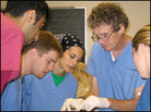 Professor David Pumplin instructs medical students in the lab. Professor David Pumplin instructs medical students in the lab.