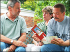Director Bill CouturiƩ talks with Paula and Michael Zasadny, parents of Pfc. Holly McGeogh. Director Bill CouturiƩ talks with Paula and Michael Zasadny, parents of Pfc. Holly McGeogh.