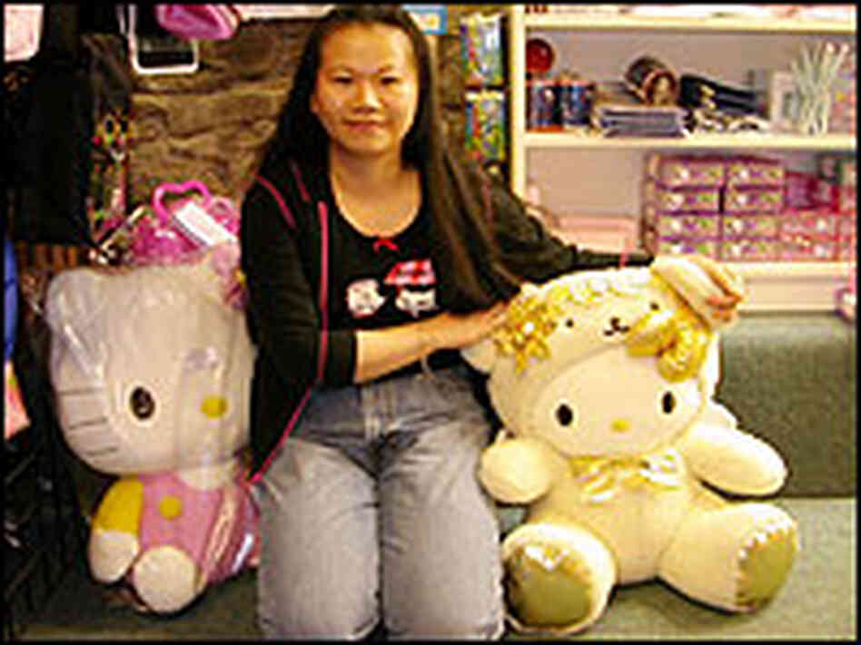 Vickie Pan Poses with Hello Kitty Dolls Vickie Pan Poses with Hello Kitty Dolls