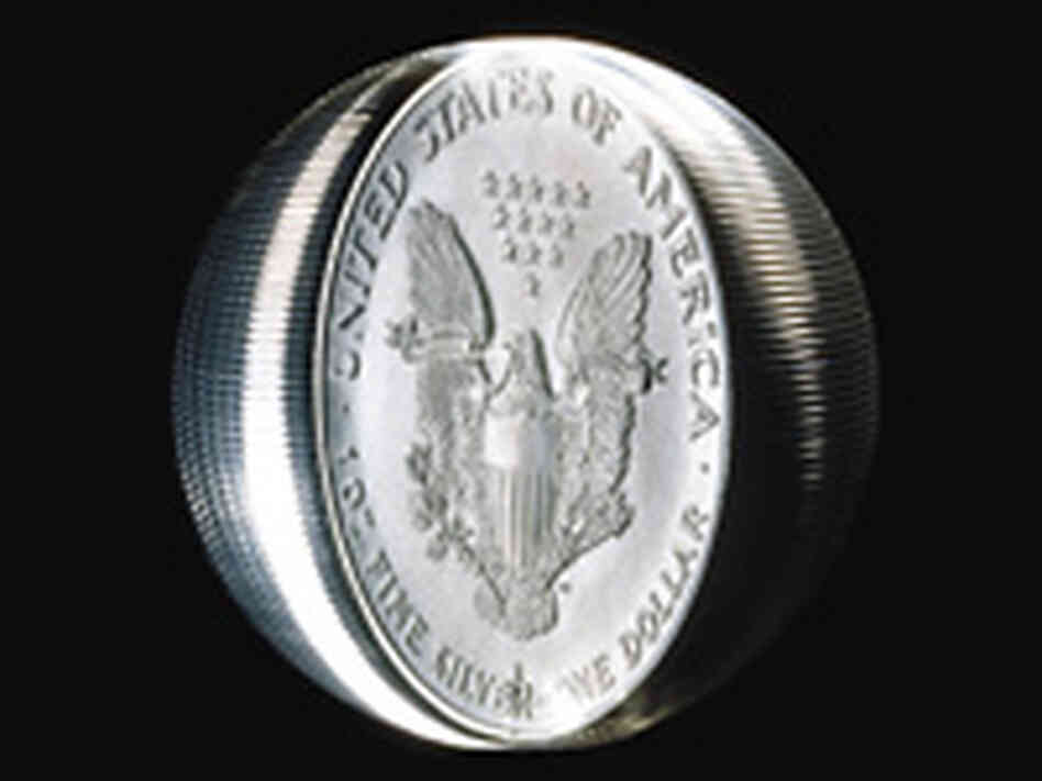 A spinning coin A spinning coin
