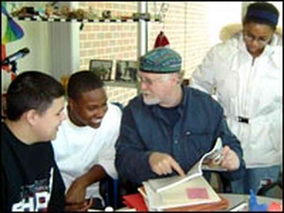 Dennis Littky meets with students Kyle Williams, Jesse Jones and Audris Valdez. Dennis Littky meets with students Kyle Williams, Jesse Jones and Audris Valdez.